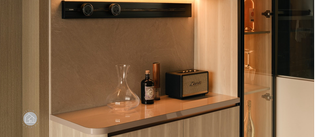 Premium condo dry bar with stone backsplash.